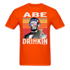 Load image into Gallery viewer, Abe Drinkin Funny Drunk Presidents Lincoln 4th of July T-Shirt - orange